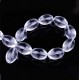Oval glass beads 15x10mm Transparant